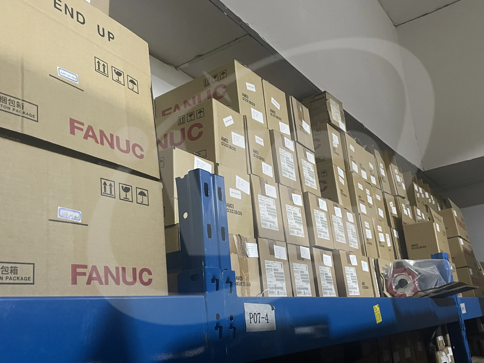 FANUC cartons stored on warehouse racks at VCOCNC