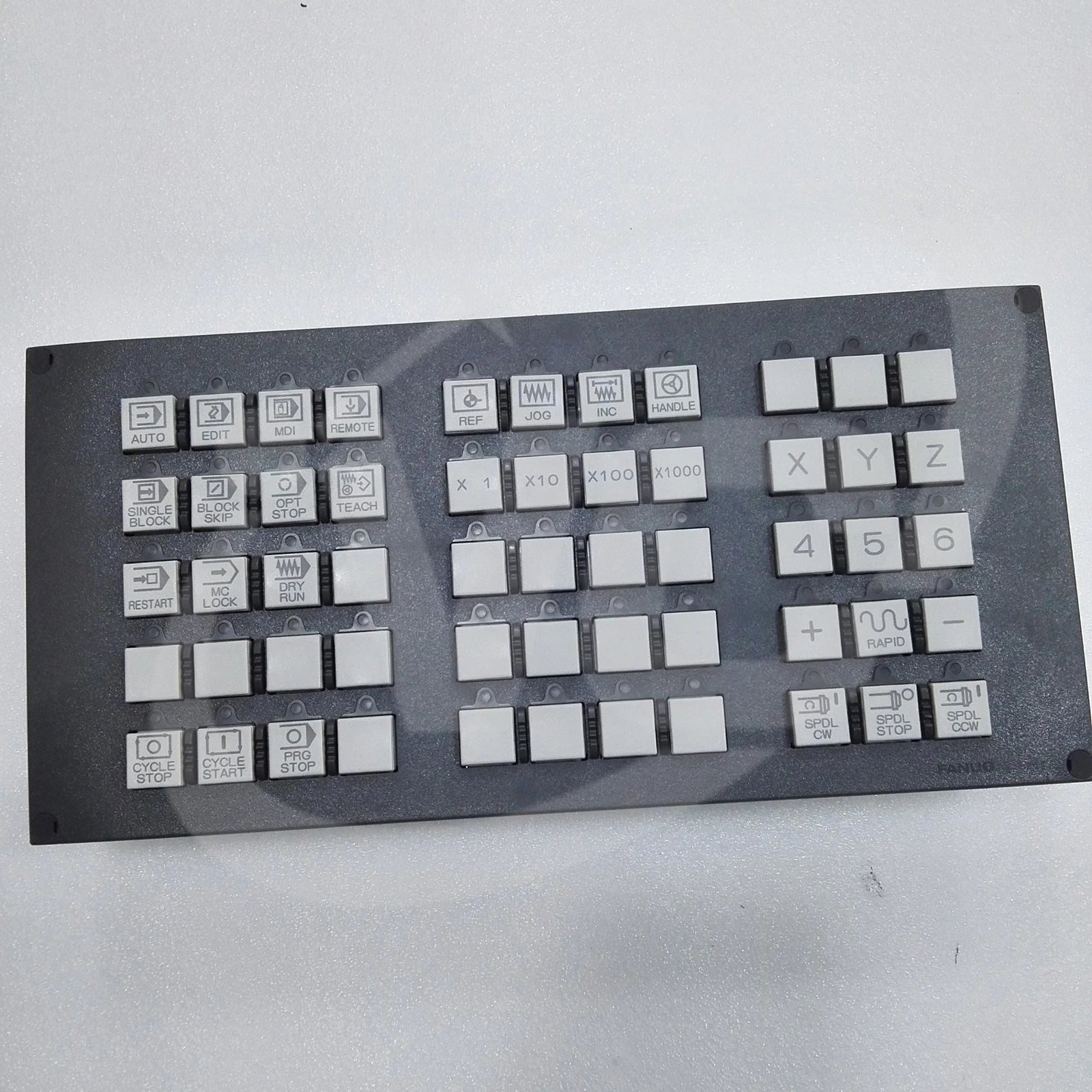 FANUC A02B-0303-C231 machine operator panel front showing mode, axis, cycle and spindle control keys